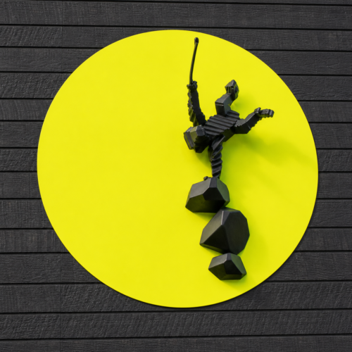 Abstract black geometric sculpture suspended from a chain against a bright yellow circle on dark wooden background.